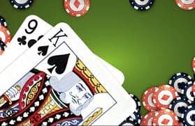 Live dealer table at ganda303 studio with multi-angle camera feeds and real playing cards